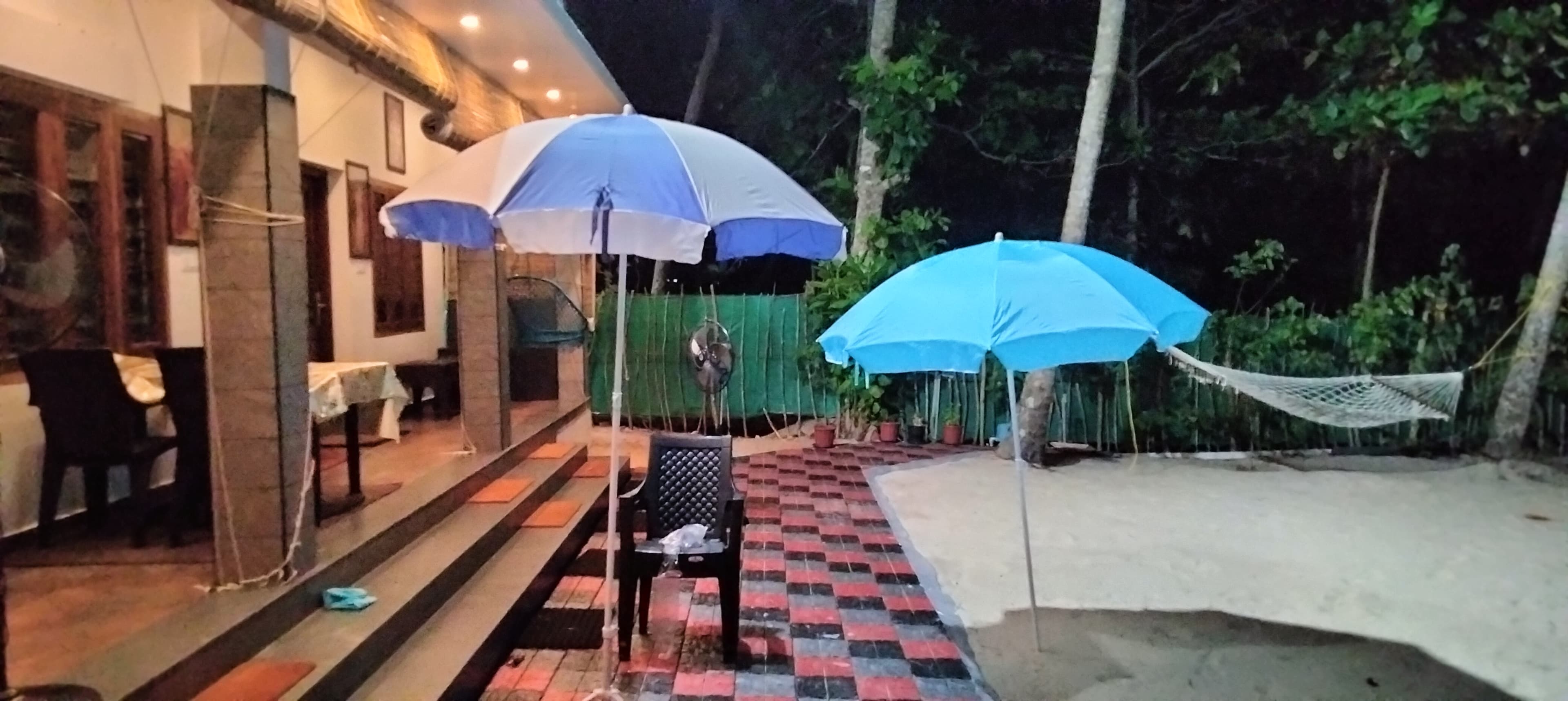 Front view with lush greenery